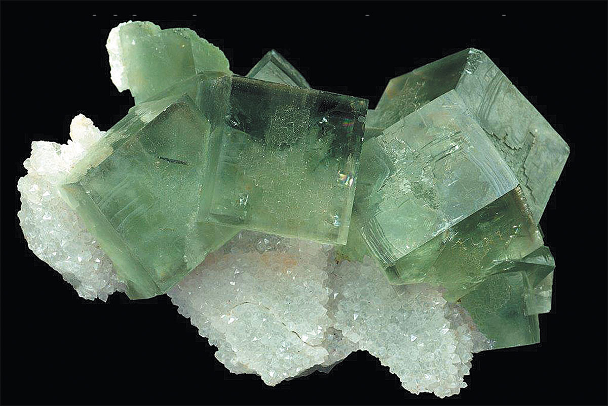 FLUORITE VERTE SUR QUARTZ. salon-des-mineraux